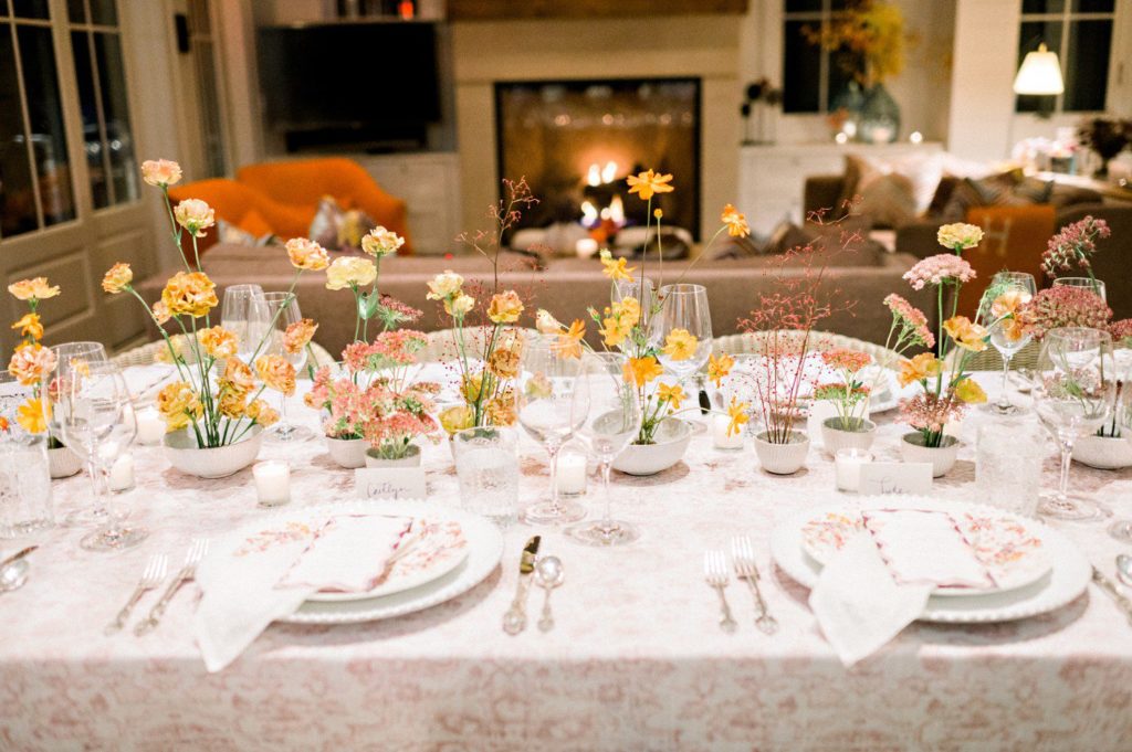 Wedding Reception Table with Orange and Blush Florals