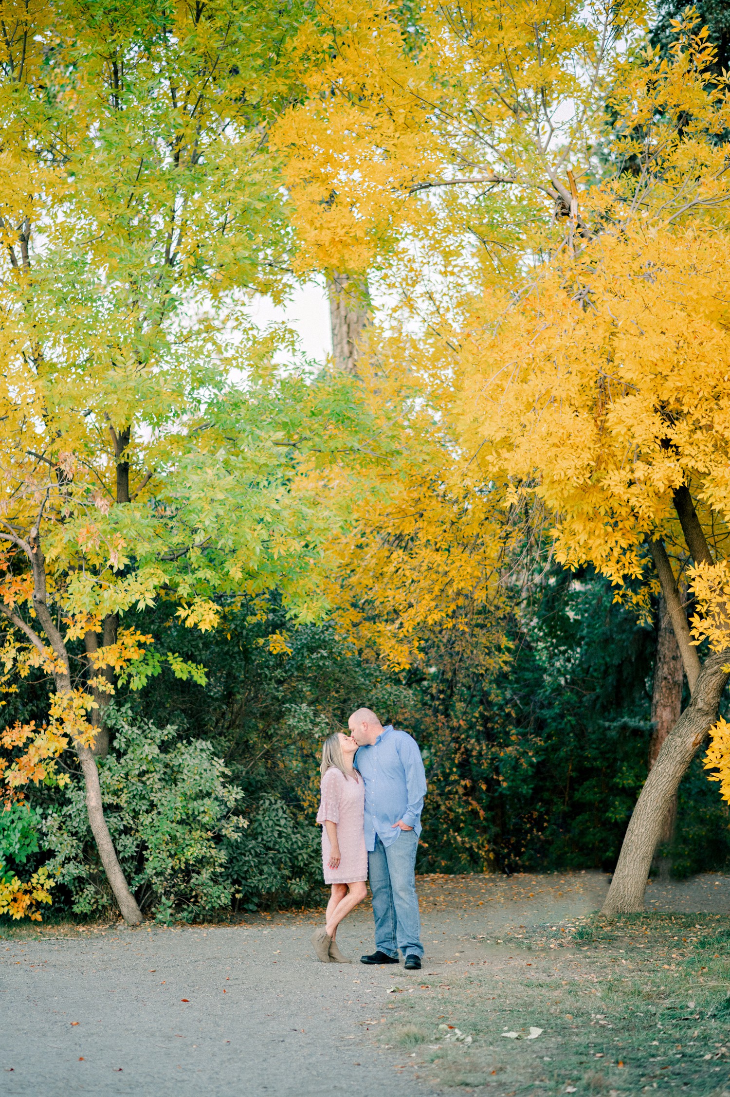 Engagement session at Fly'N B Park with fall color leaves.
