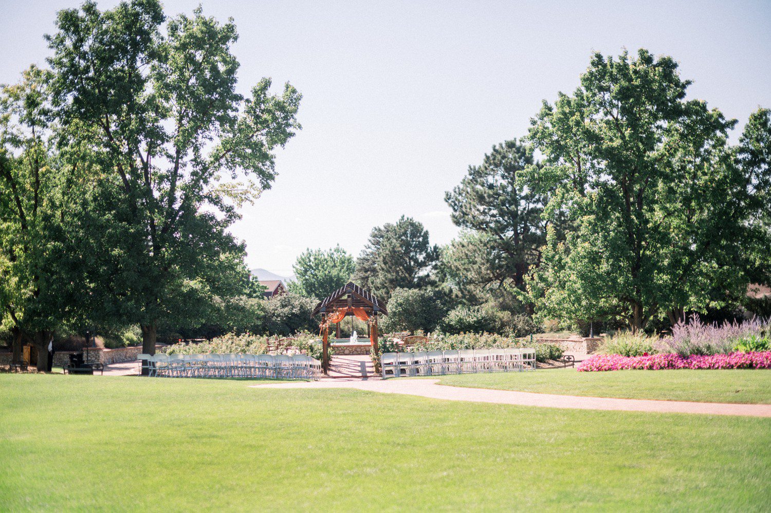 Wedding ceremony at Hudson Gardens in Denver.