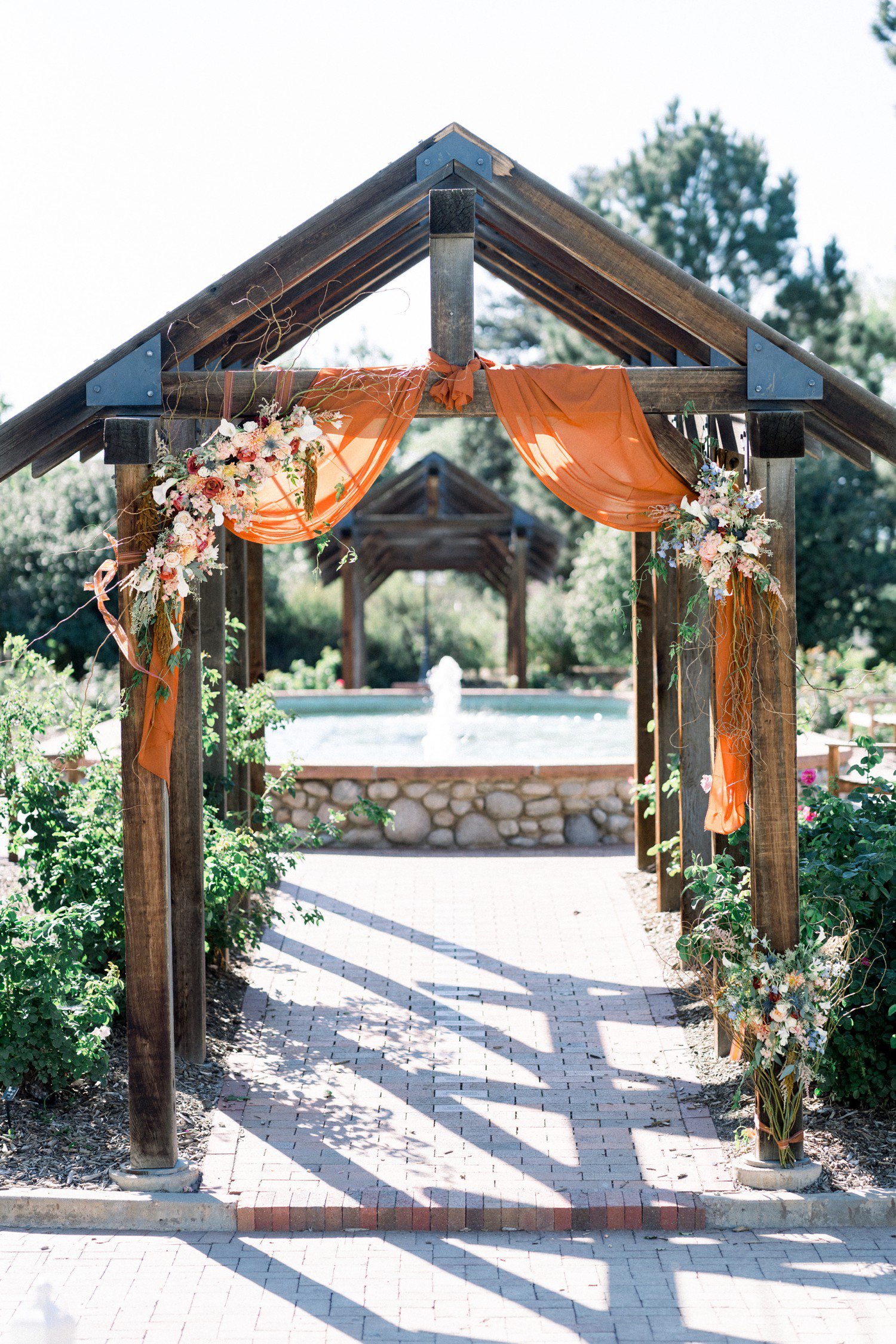 Wedding ceremony pergola at Hudson Gardens in Denver.