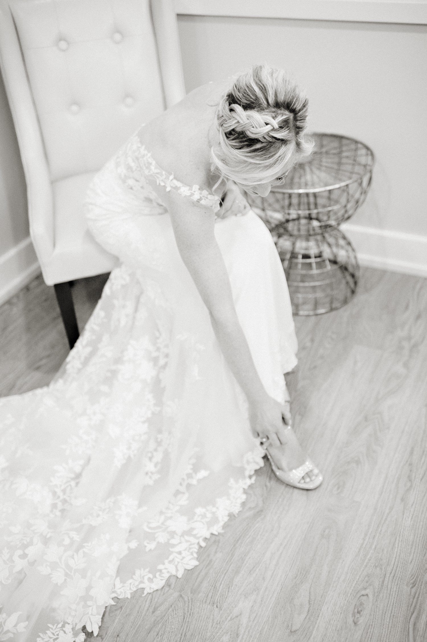 Bride putting on shoes and getting ready.