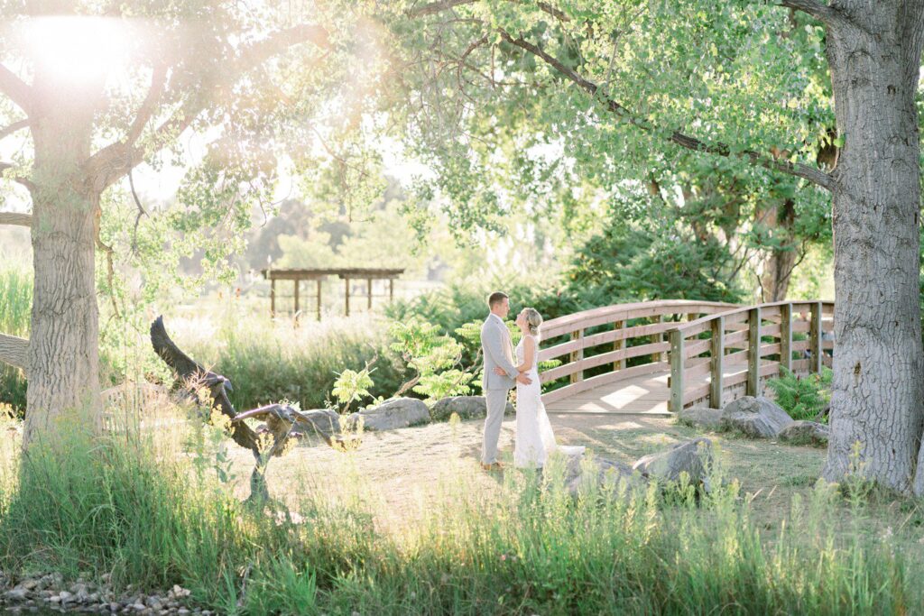 Sunset wedding photos at Hudson Gardens in Denver.