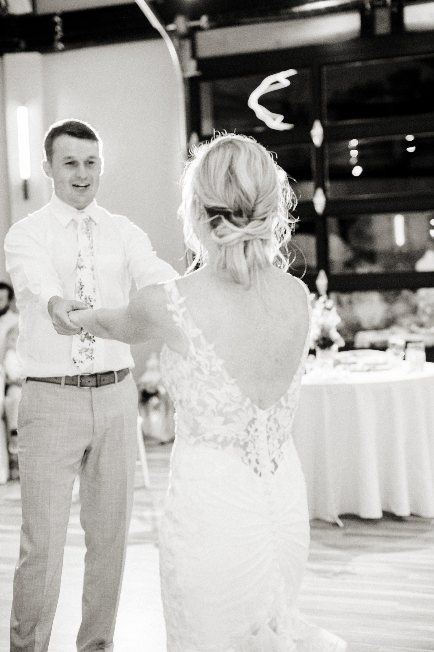 Bride and groom dancing during reception at Hudson Gardens.