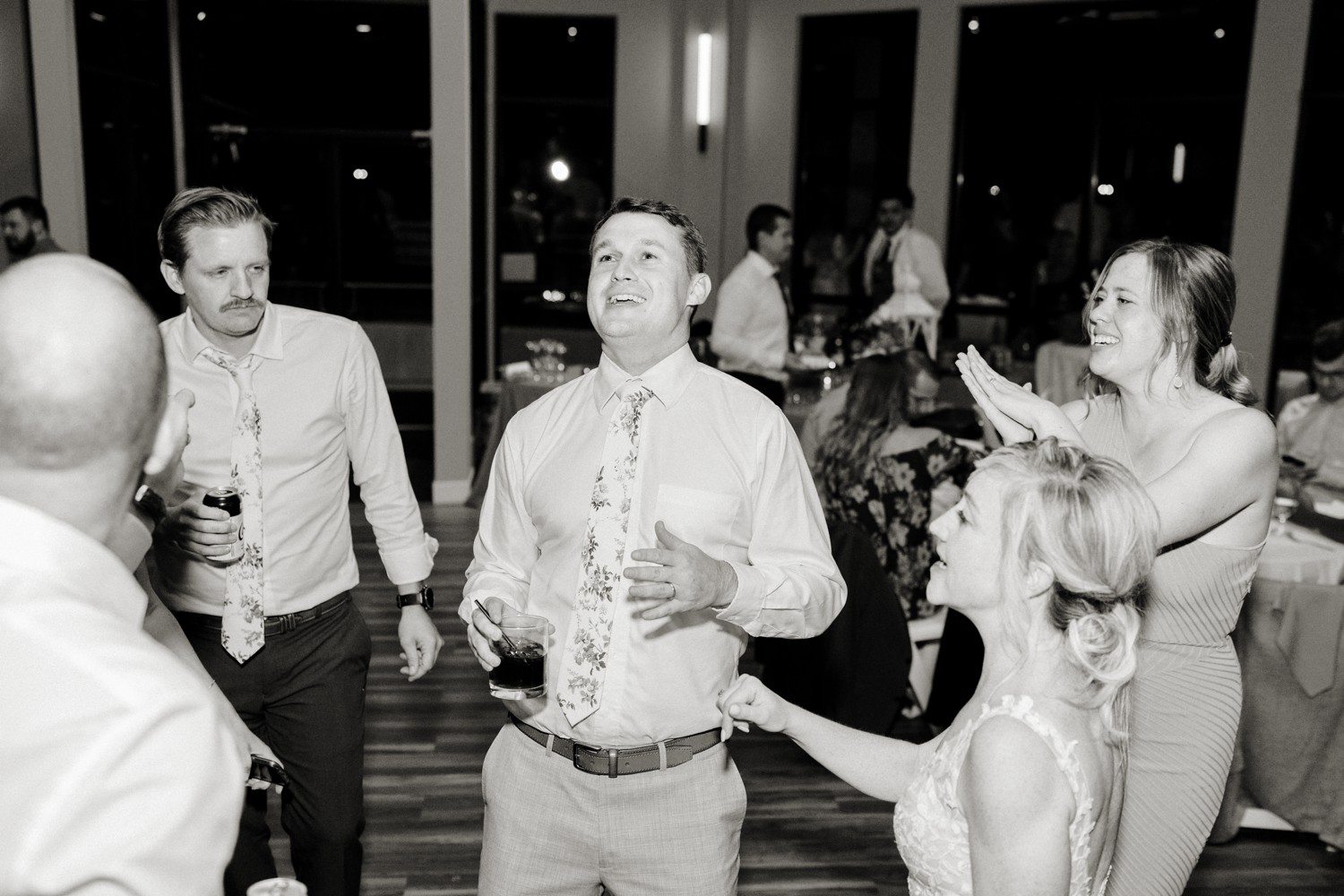 Bride and groom dancing during reception at Hudson Gardens.