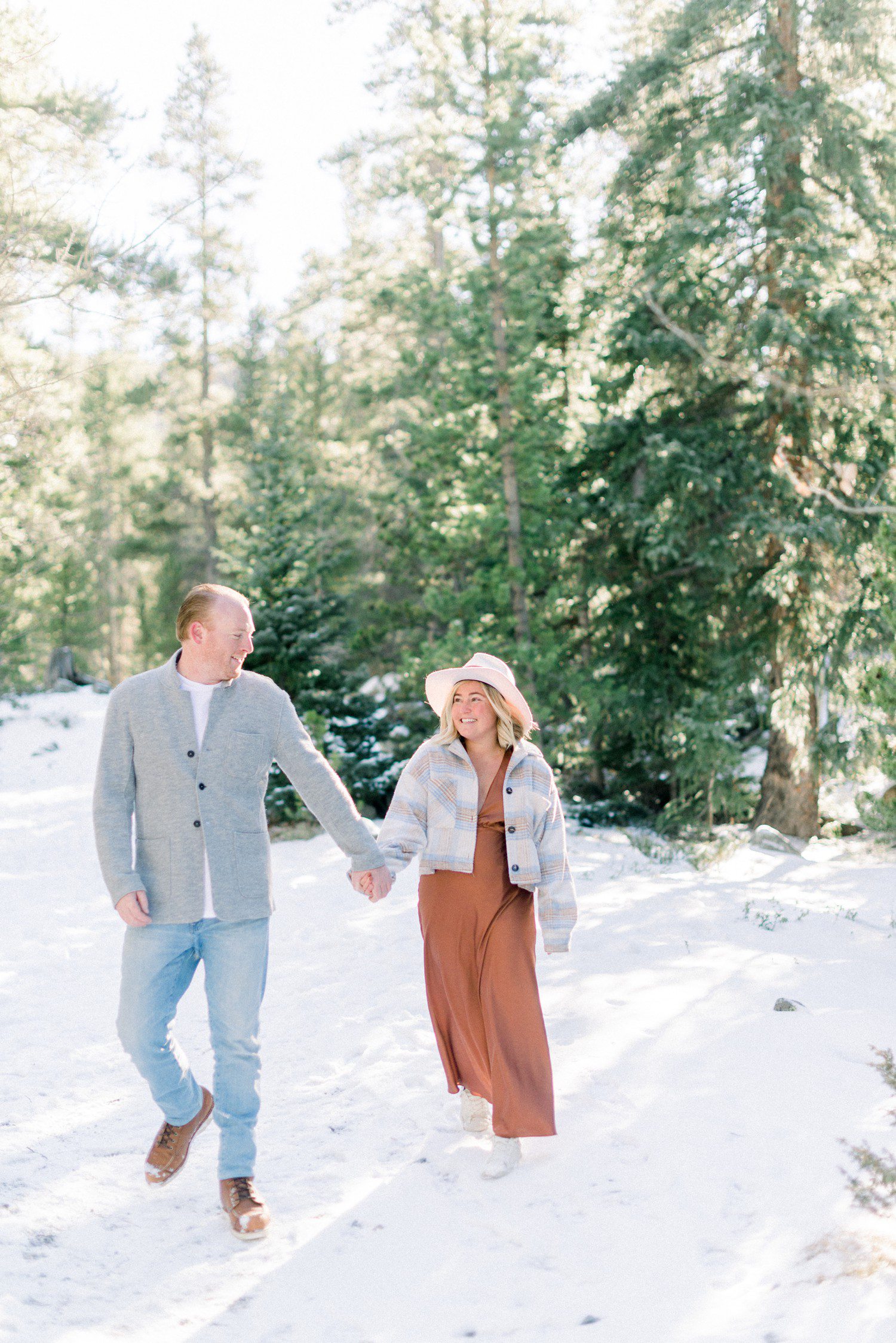 Walking engagement photos at Officer's Gulch near Vail, CO.