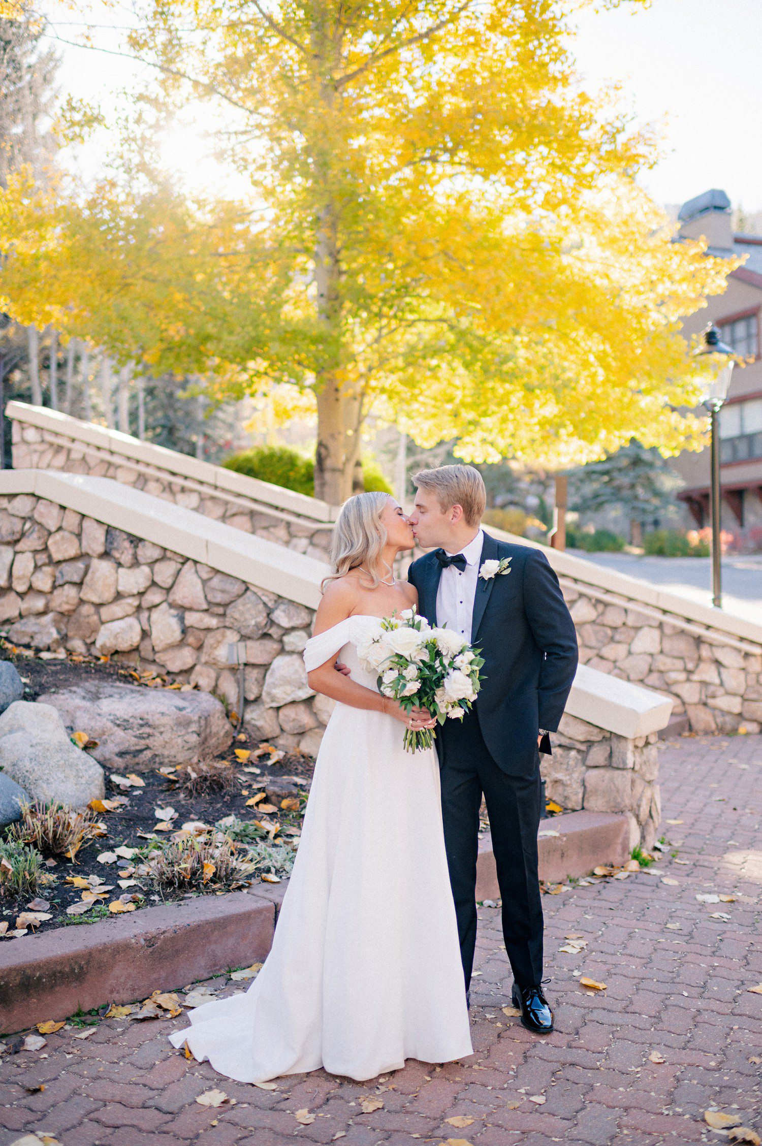 Bride and groom portraits at The Chapel at Beaver Creek after wedding ceremony. 