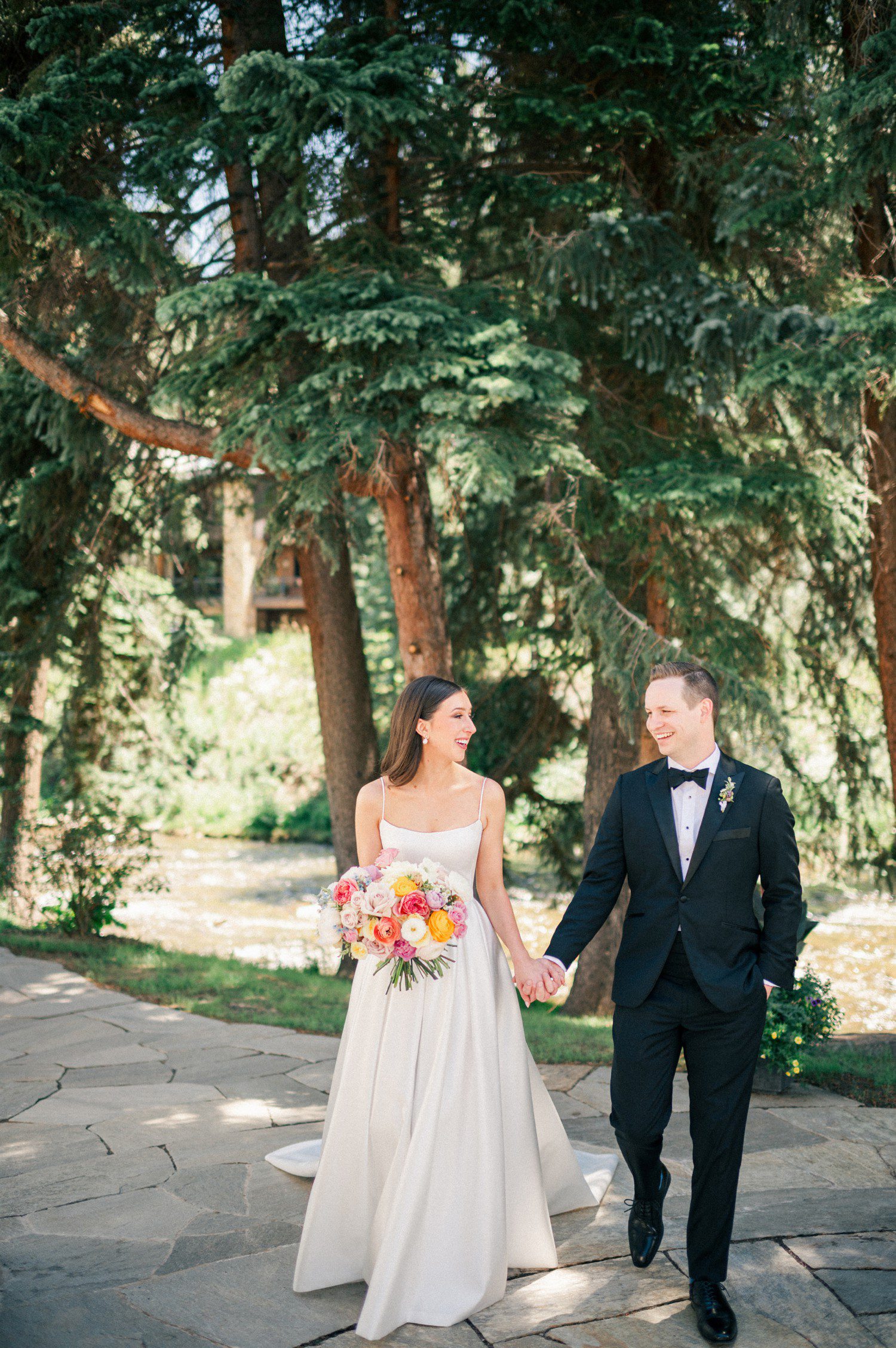 Bride and groom photos in Vail before wedding at Vail Chapel. 