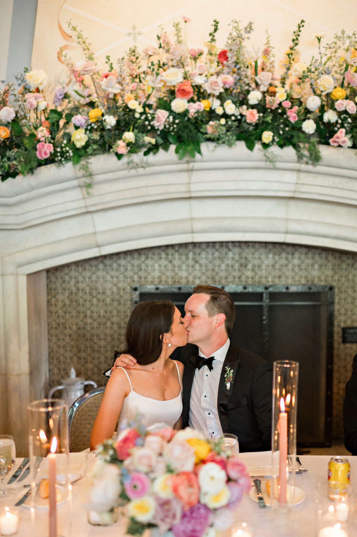 Bride and groom kissing during wedding reception at The Arrabelle in Vail Colorad. 