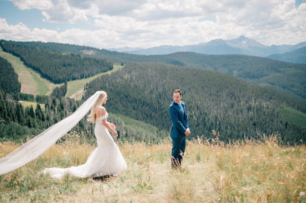 Wedding first look in Vail on Vail Mountain. 