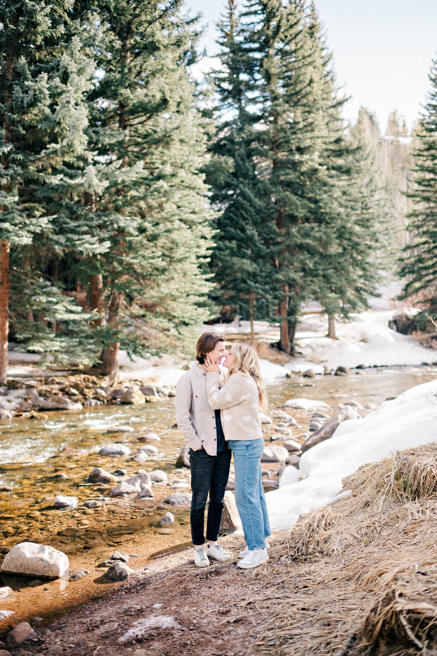 Vail engagement photos near Gore Creek. 