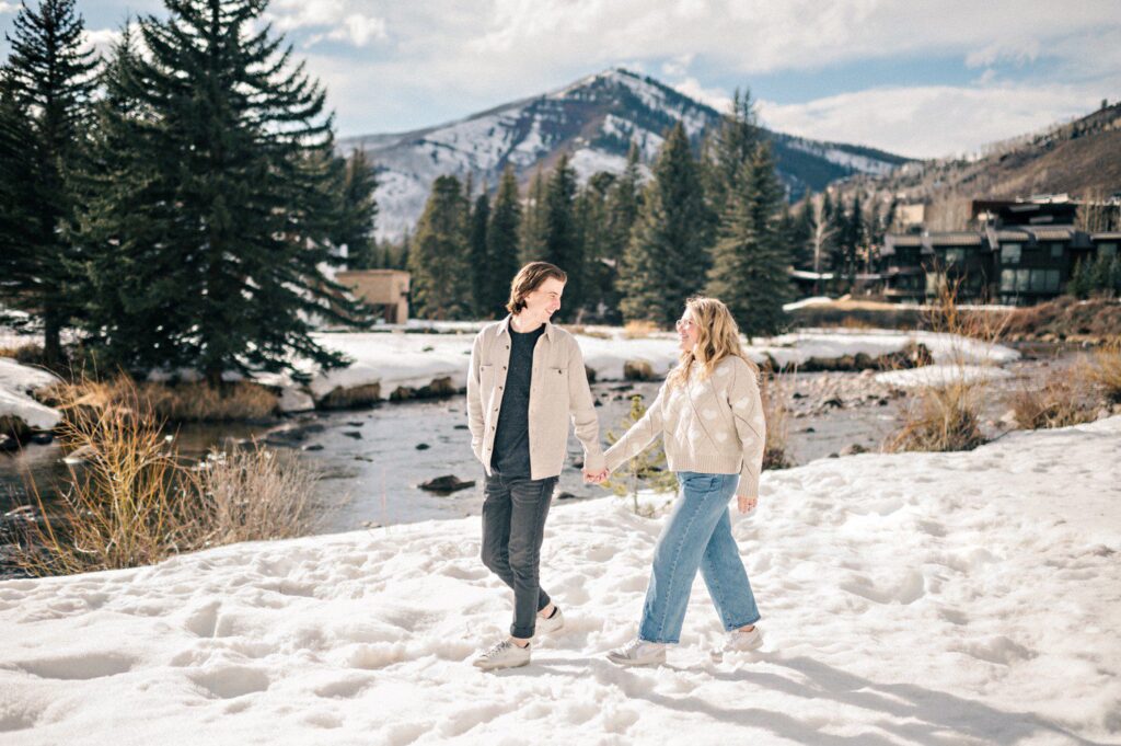 Winter Vail Village engagement photos near Gore Creek. 